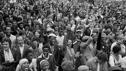 Paul Trevor, Anti-racists gather to block route of National Front demonstration, New Cross Road, London, August 1977 © Paul Trevor